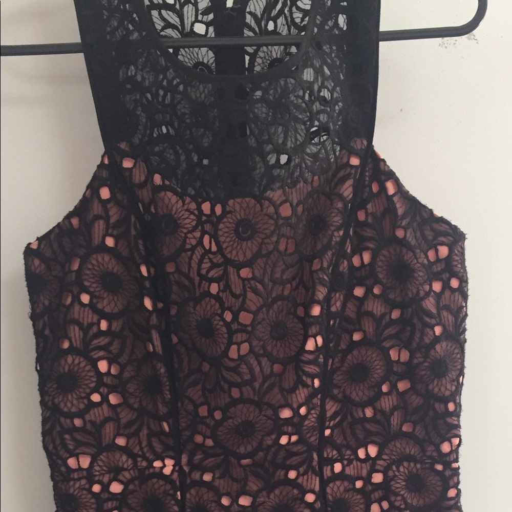 Cute Jessica Simpson lace dress with peach lining.